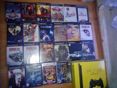 2015 m. 12 advento diena. Playstation 2 žaidimai ir konsolė.